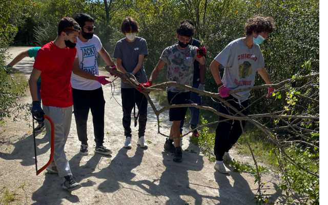 Plainfield Central and South High School science students help clean Renwick Rookery