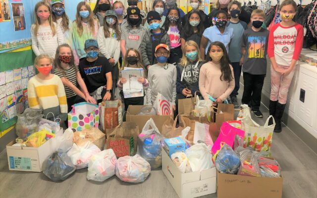 Troy Shorewood Student Ambassadors donate to the troops through Operation Care Package  4th graders paired with Knights of Columbus to collect donations